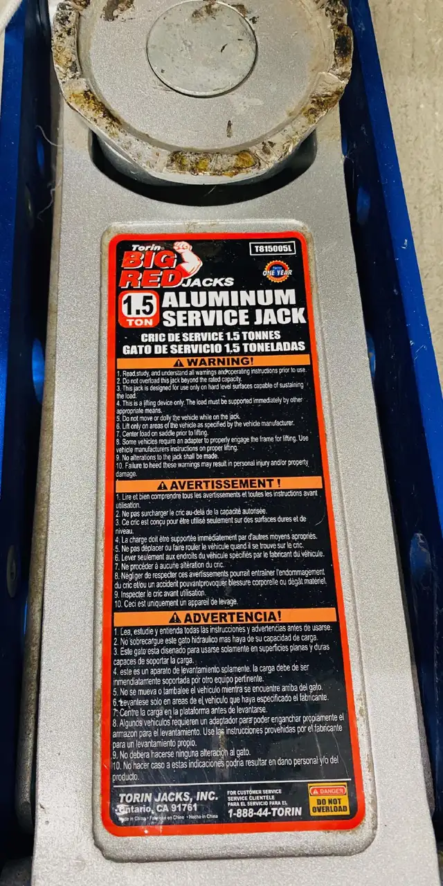 Big Red 1.5 ton garage floor service jack.