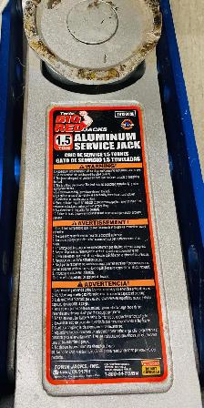 Big Red 1.5 ton garage floor service jack.