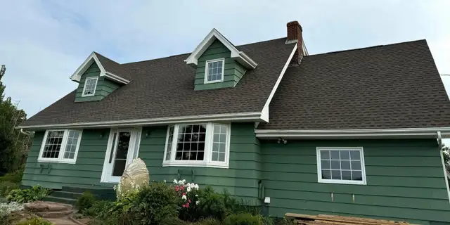 Steel & Shingle Roofing - Photo 2