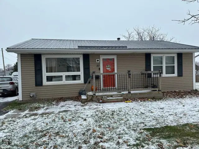 Steel & Shingle Roofing - Photo 5