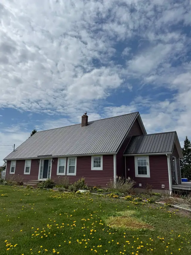 Steel & Shingle Roofing - Photo 6