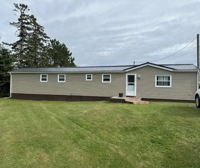 Steel & Shingle Roofing - Photo 7