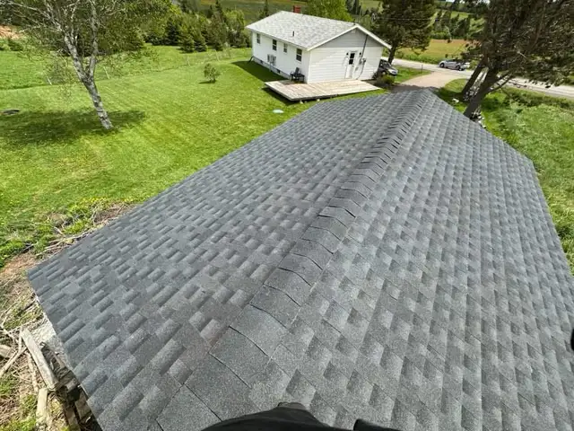 Steel & Shingle Roofing - Photo 8