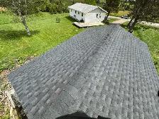 Steel & Shingle Roofing - Photo 8