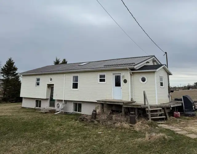 Steel & Shingle Roofing - Photo 9