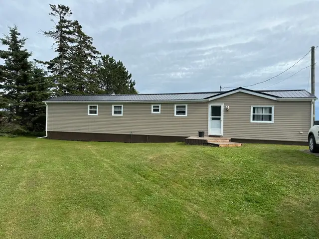 Steel & Shingle Roofing - Photo 10