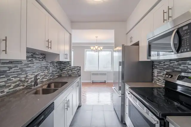 spacious 3-bed,2-bath condo for July 1, Westmount adj - ID 4458