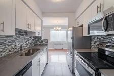 spacious 3-bed,2-bath condo for July 1, Westmount adj - ID 4458