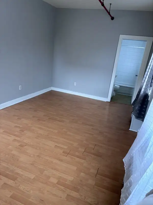 Spacious Bachelor Bedroom in a Historic Building - Photo 6