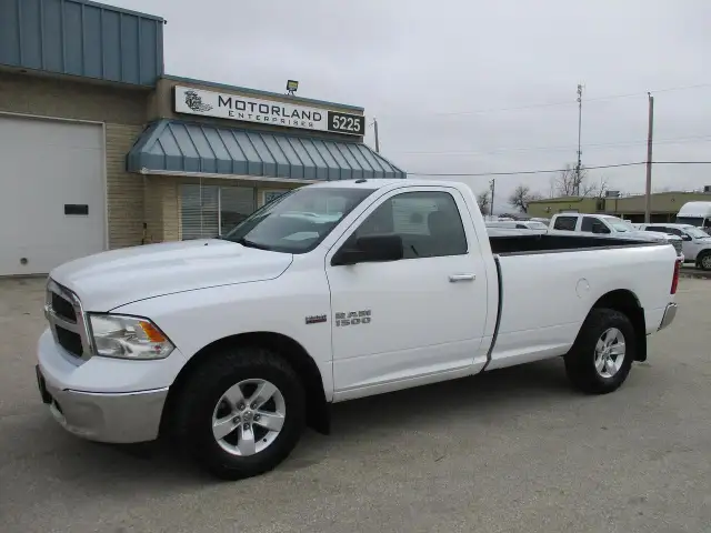 2015 RAM 1500 4WD Reg Cab 140.5' SLT