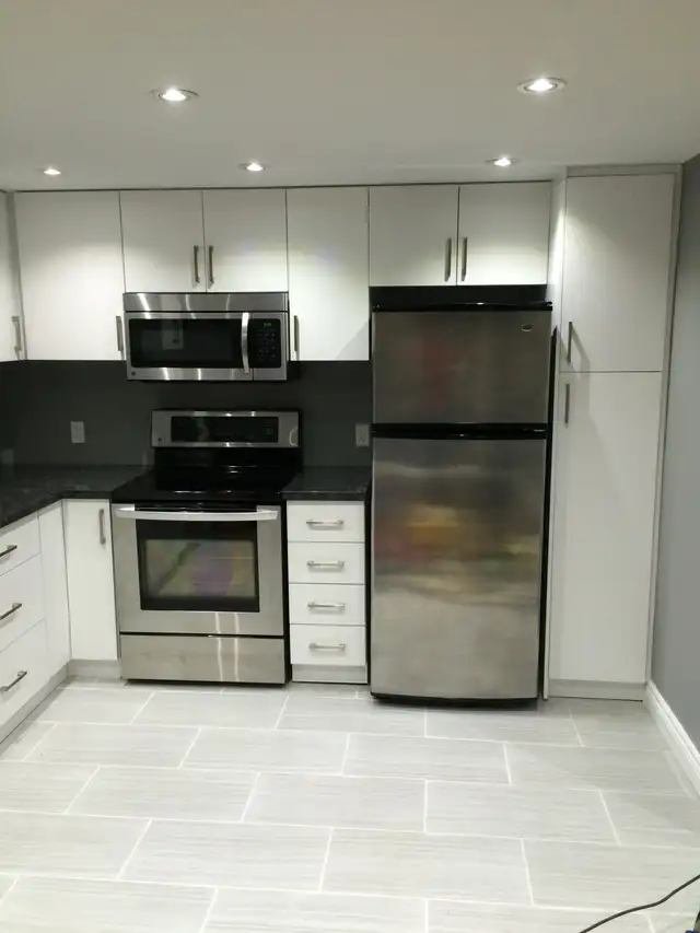 2-Bedroom Basement Apartment with Parking -utilities included - Photo 2