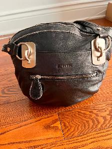 Sac à main JOANEL 100% cuir en excellente condition. Prix 80 $.