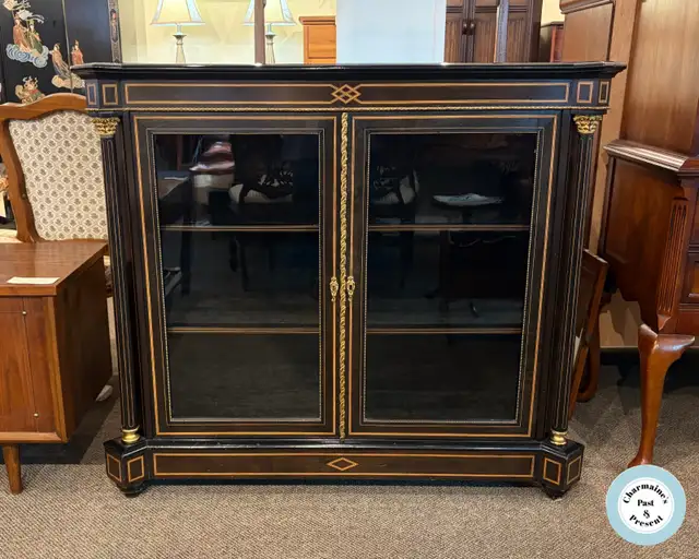 Antique French Ebonized Wood Glass Door Cabinet at Charmaine's