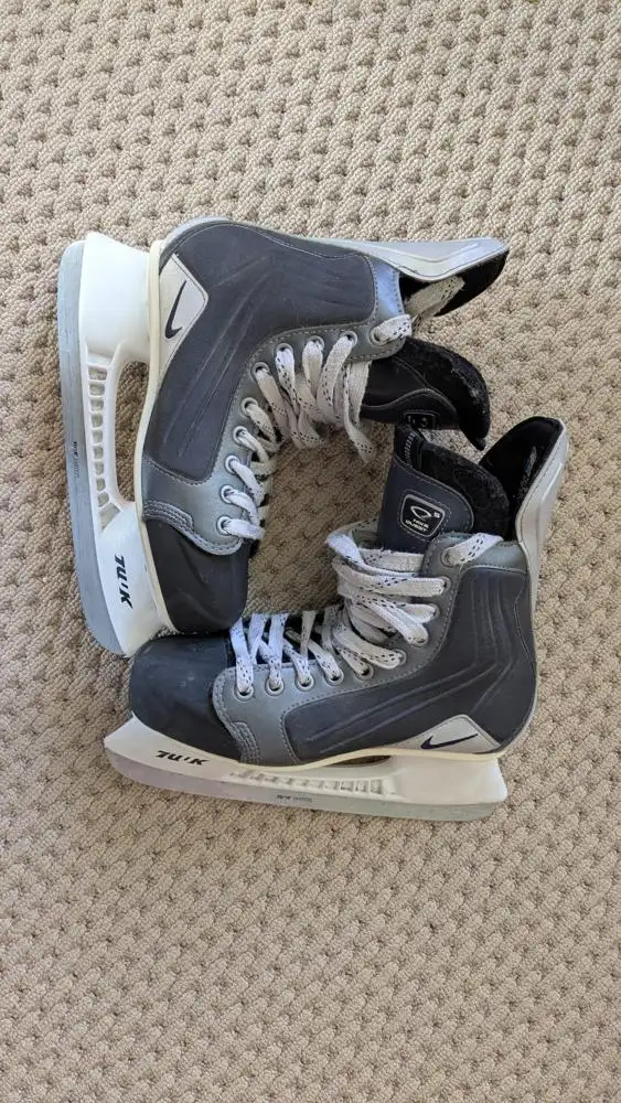 Nike with Tuuk blades size 6.5 D