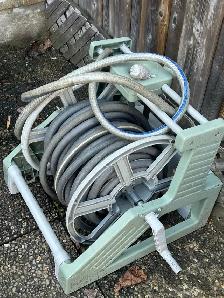 Slide Track Hose Handler With Hose