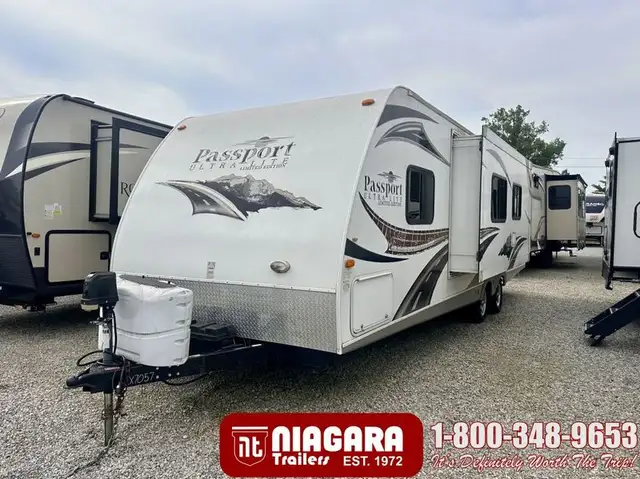 2011 KEYSTONE PASSPORT ULTRA LITE 280BH Travel Trailer - Photo 2