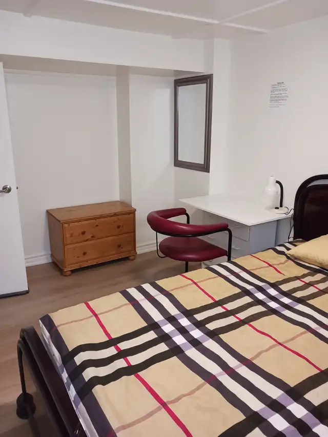 A brand new private day room with a queen-size bed