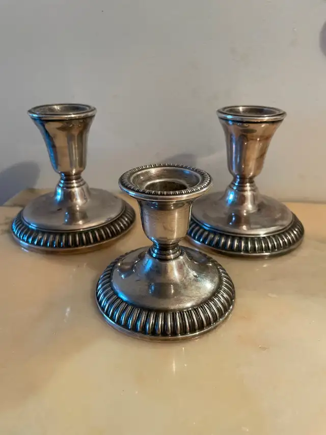Three vintage candle holders by BIRKS REGENCY PLATE