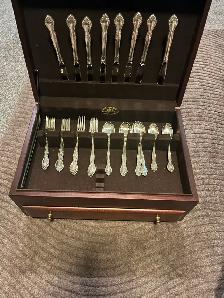 S.S. dining utensils and cherry storage chest