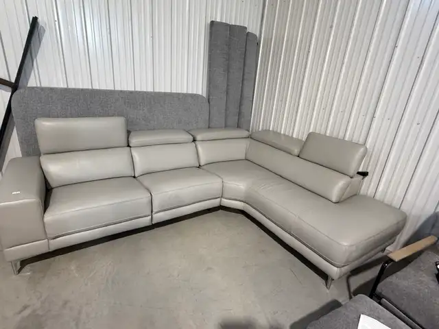 Grey leather sectional with power seat