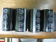 FOUR CAPXOM  ELECTROLIC  CAPACITORS RADIAL