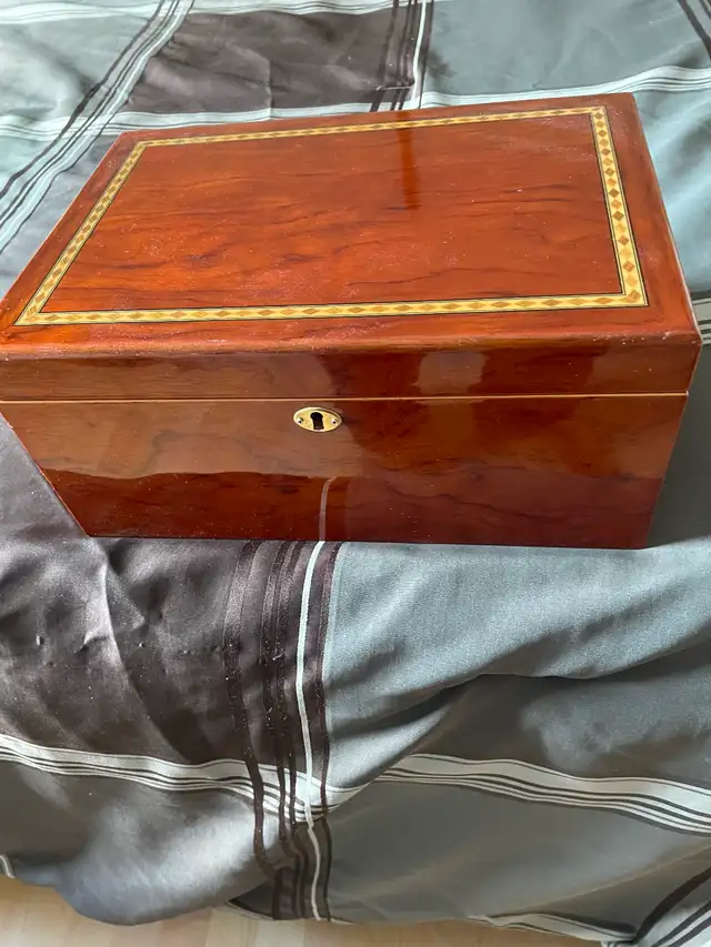 IDC Humidor with a few cigars and accessories $75.
