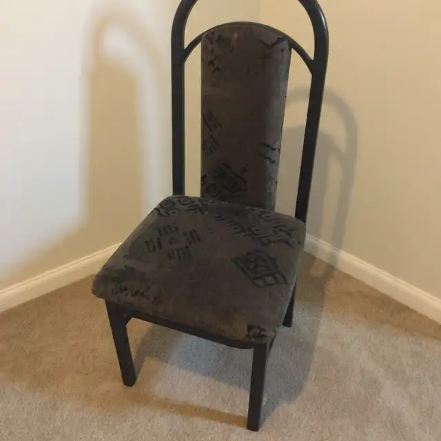 black cushioned slat-back chair- I have LOTS of chairs here