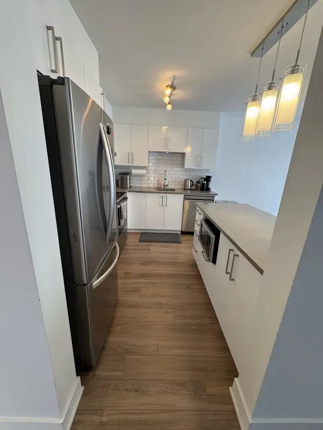 Beau logement 4-1/2 type condo - Photo 2