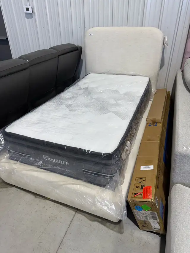 Twin sized bed frame with mattress