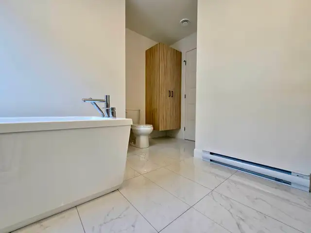 5½ NEUF STYLE CONDO (1300 pi²) – ÎLOT 8’   DOUCHE CÉRAMIQUE   TH - Photo 6