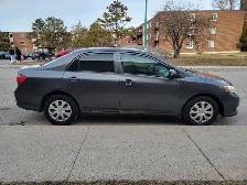 2010 Toyota Corolla fuel efficient manual four door sedan