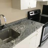 Bright, clean, Mainfloor 2 BR suite Liv room, on lake, All inclu - Photo 3