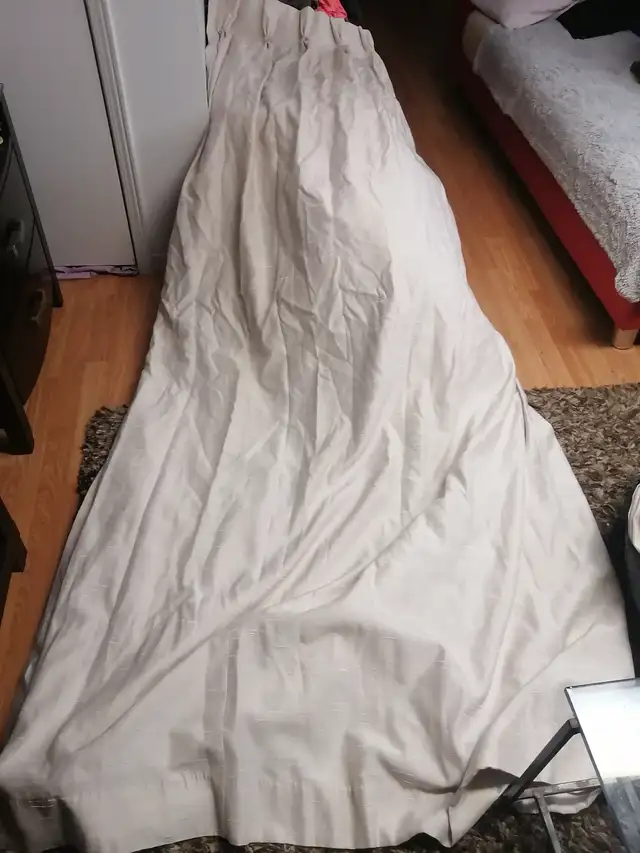 Two standard size white curtains