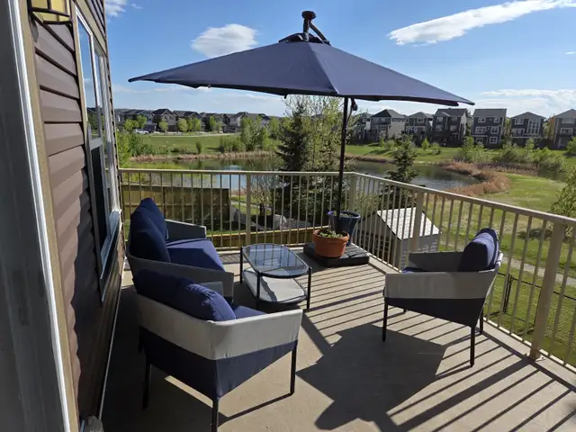 BRAND NEW - 4 PIECE PATTIO SET - STILL IN PLASTIC