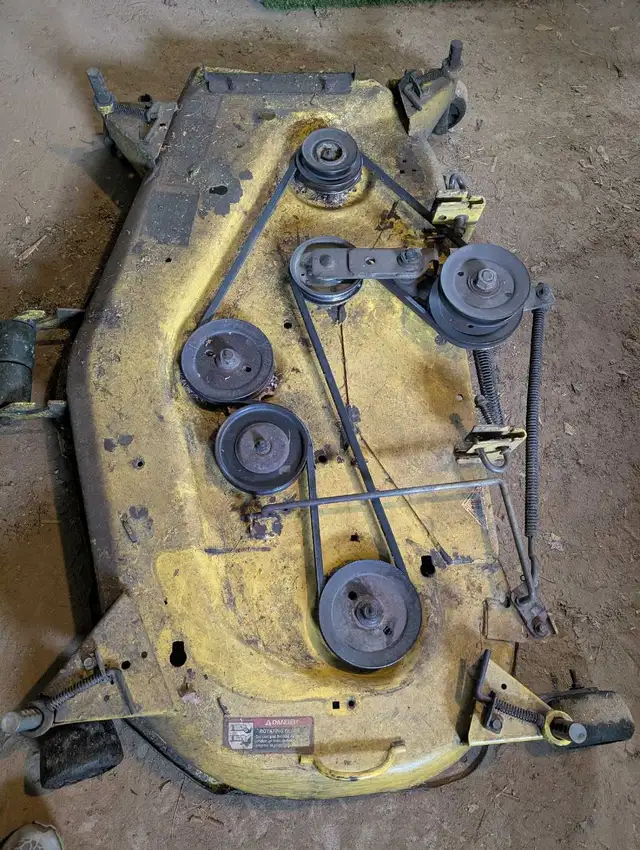 Looking for 2 John Deere decks