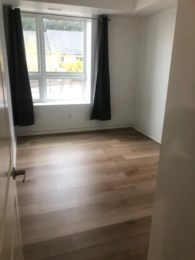 Spacious 3-Bedroom Condo with Balcony, Parking & Ensuite Laundry - Photo 4