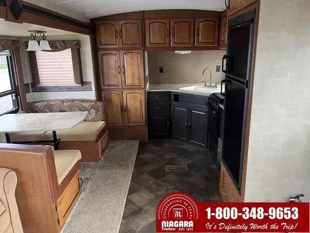 2014 KEYSTONE SPRINGDALE 299FKGL Travel Trailer - Photo 8