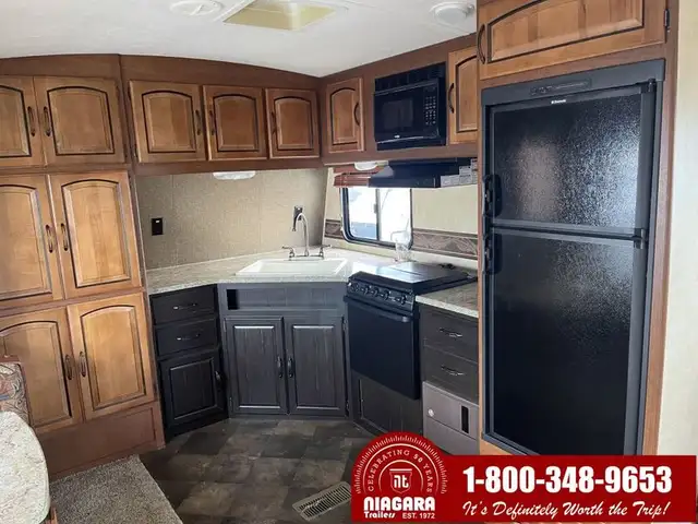2014 KEYSTONE SPRINGDALE 299FKGL Travel Trailer - Photo 9