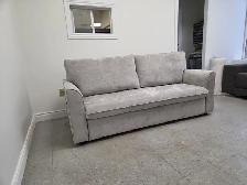 Grey Fabric Sofa Bed with Storage in Arms for only $699.