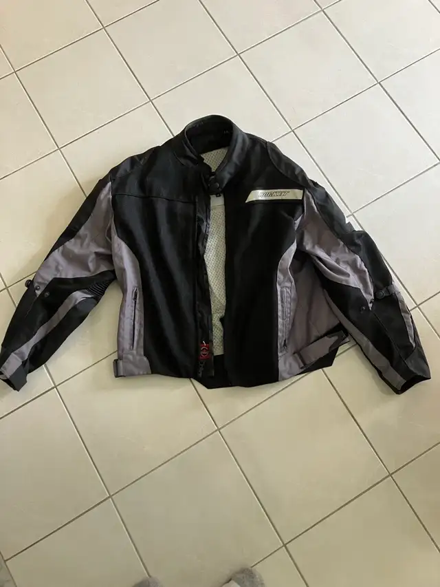 Motorcycle jackets, 1 Joe Rocket and 1 leather