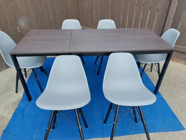 Extendable table with chairs - Photo 8