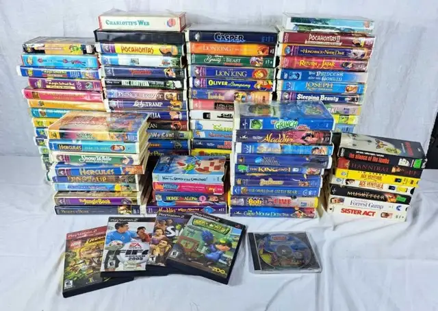 Large collection of Disney, Pixar, Dreamworks, other VHS movie