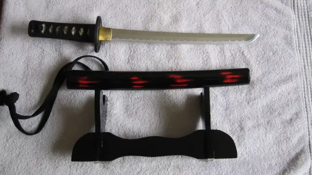 JAPANESE TANTO SWORD WITH SCABBARD ON DISPLAY STAND