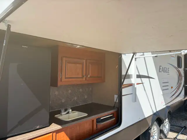 2013 Jayco Eagle 32’ with bunks and outdoor kitchen - Photo 3
