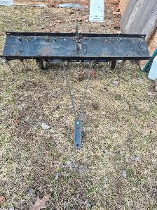 A louer dechaumeuse sur tracteur a pelouse