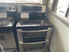 Cuisinière stainless vitrocéramique double fours LG