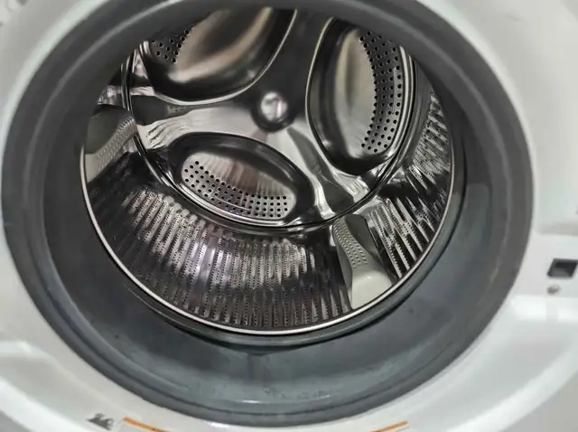 NEWER MODEL! GE 24' White Front-Load Stackable Washer & Dryer - Photo 4