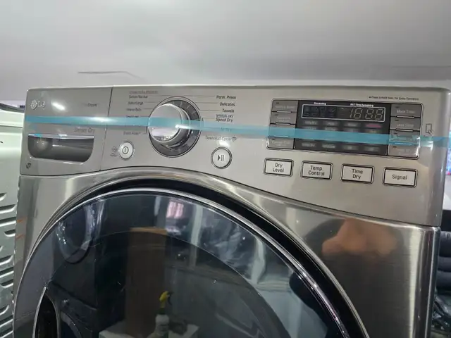 WOW LG 27' Stainless Steel Front-Load Stackable Washer Dryer Set - Photo 6