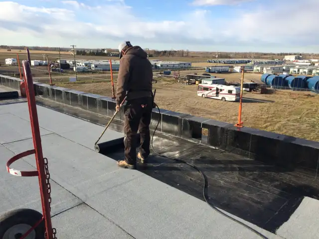 Flat Roofing Laborer - Photo 2