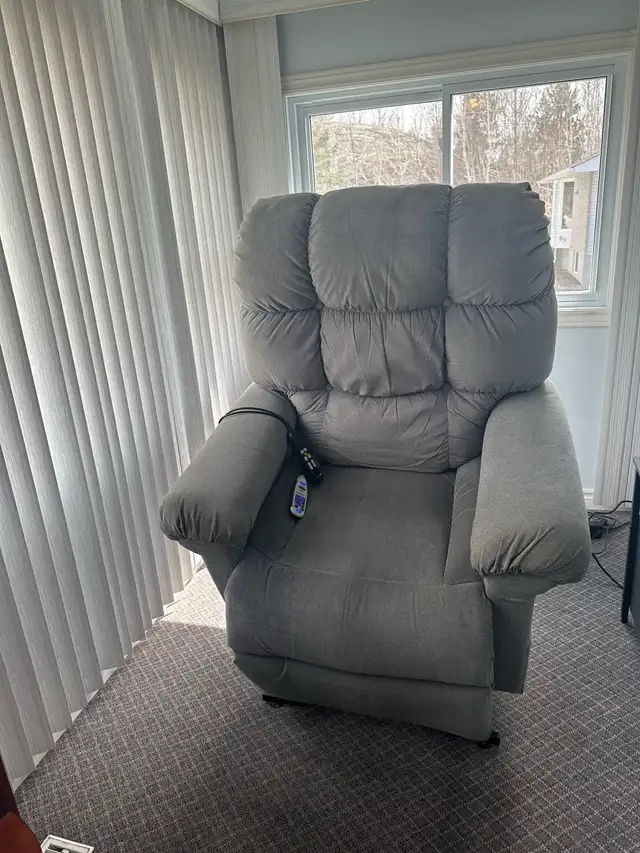 Lazy boy lift chair with massage and heat.
